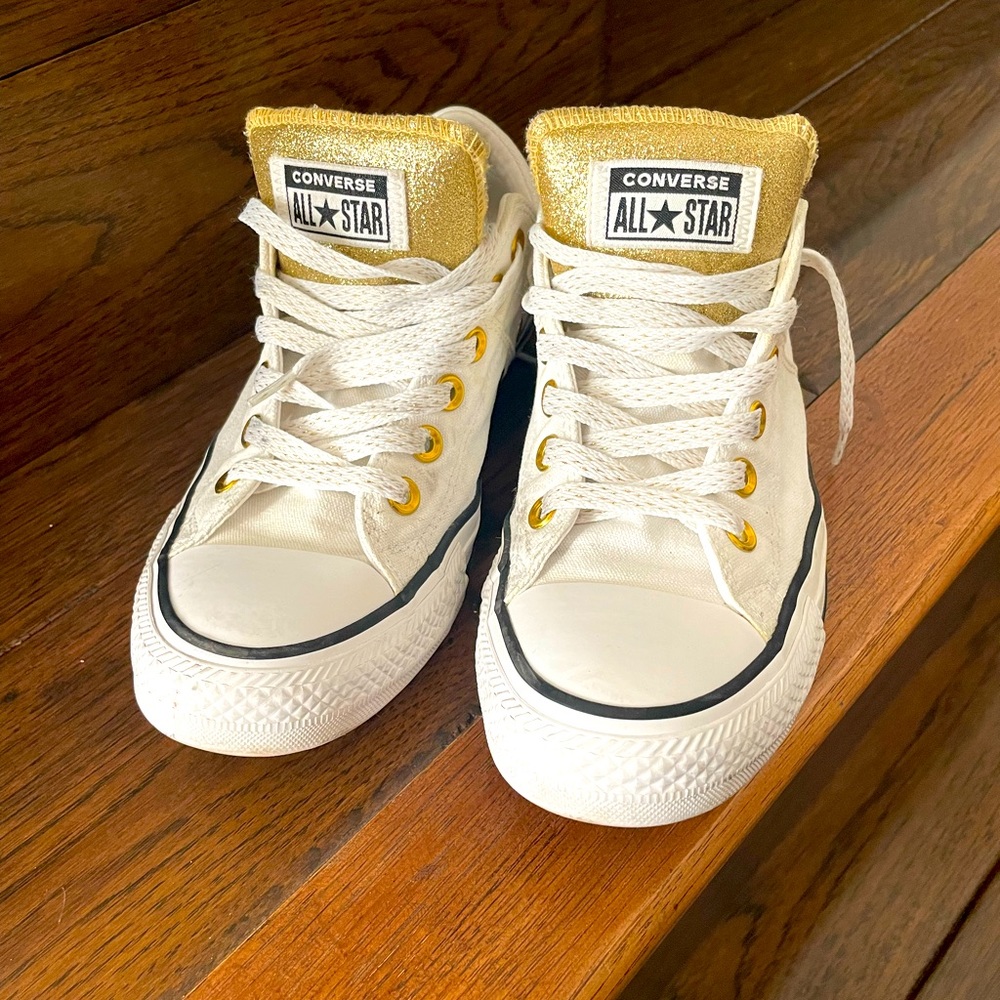 Classic Chuck’s Converse white canvas and gold